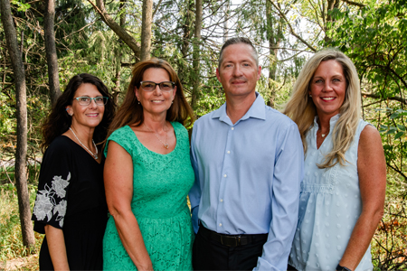 Dana Rosencrance, VP of Quality and Operations Manager, Denise Ortlip, Director of Production, Michael Moxley, Director of Business and Process Development and Leslie F. Orischak, VP and General Manager, PURESYN