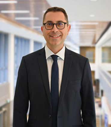 Dr. Justin Grant Dr. Justin Grant